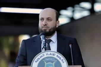 البشير رئيساً مؤقتاً للحكومة السورية الانتقالية