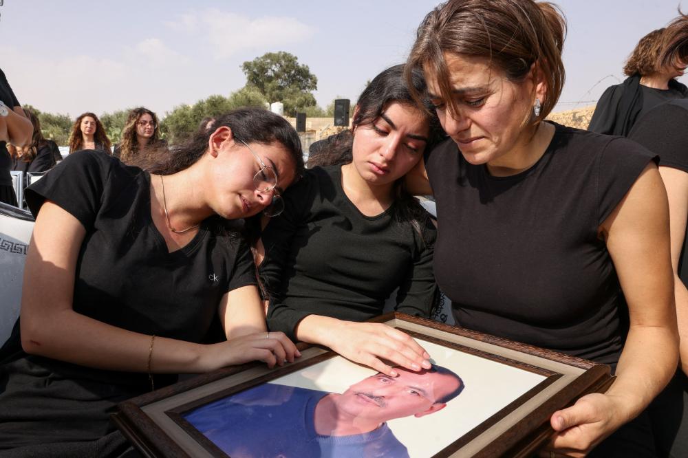 Karak Bids Farewell to Its Martyrs... and Its Bells Defy Terrorism